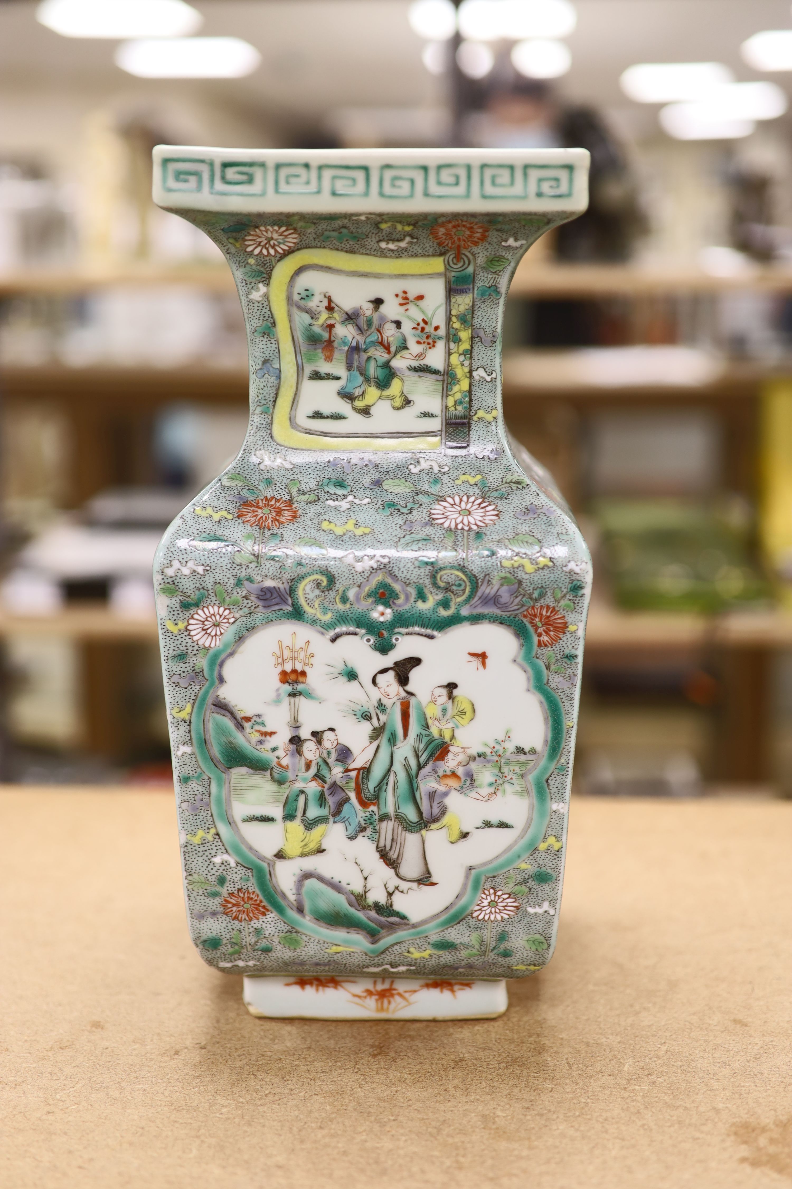 A Chinese famille verte square baluster vase, 19th century, height 32cm, restored neck